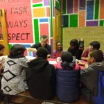 Students with teacher at Literacy Night