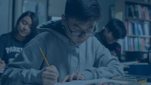 Boy Writing at desk